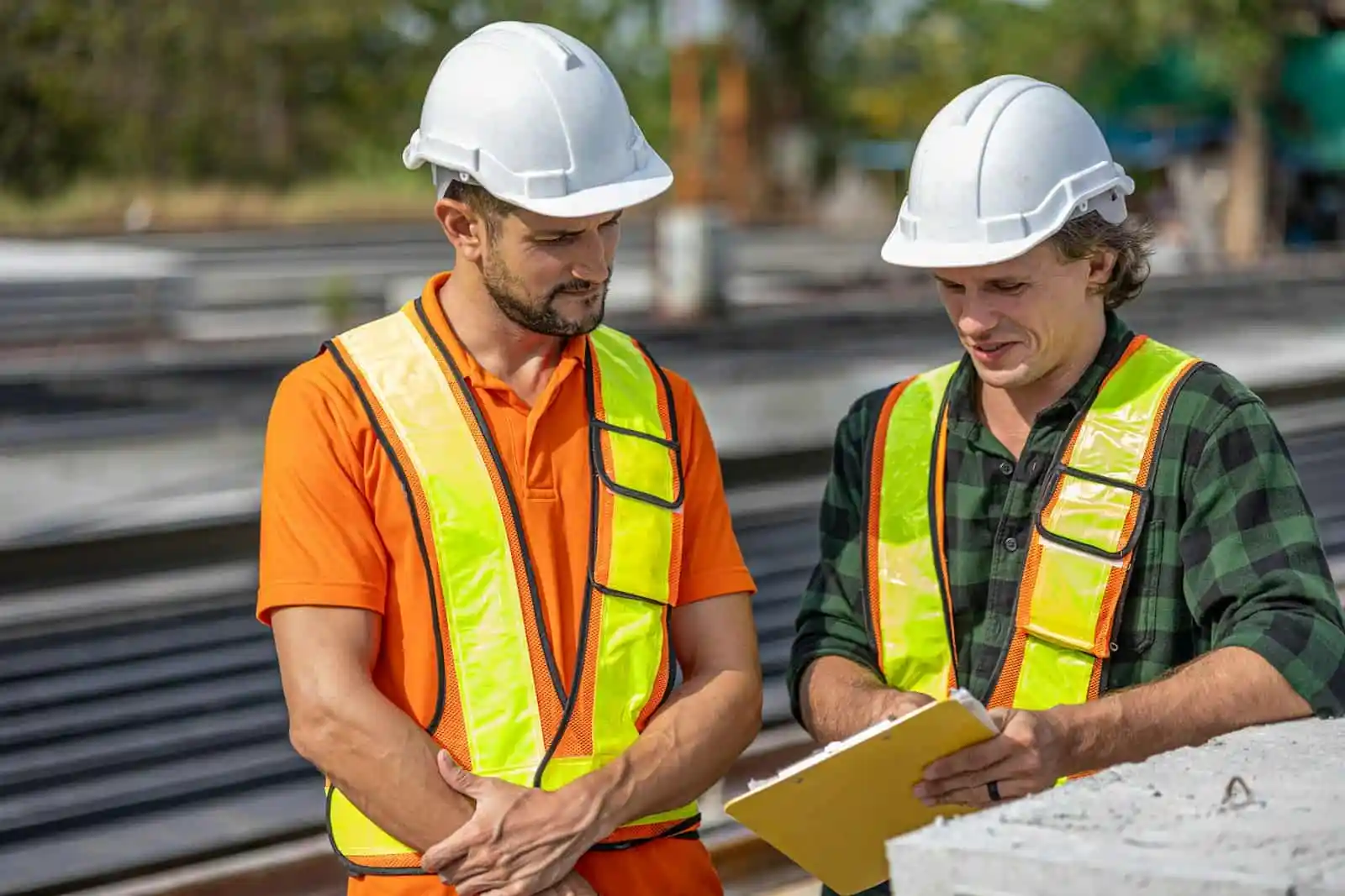 Construction professionals reviewing project plans
